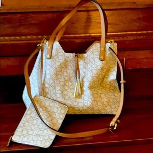 Calvin Klein purse with cross body straps.